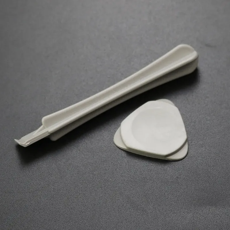 Kit de démontage de consoles portables — tournevis, spatules et médiators d'ouverture