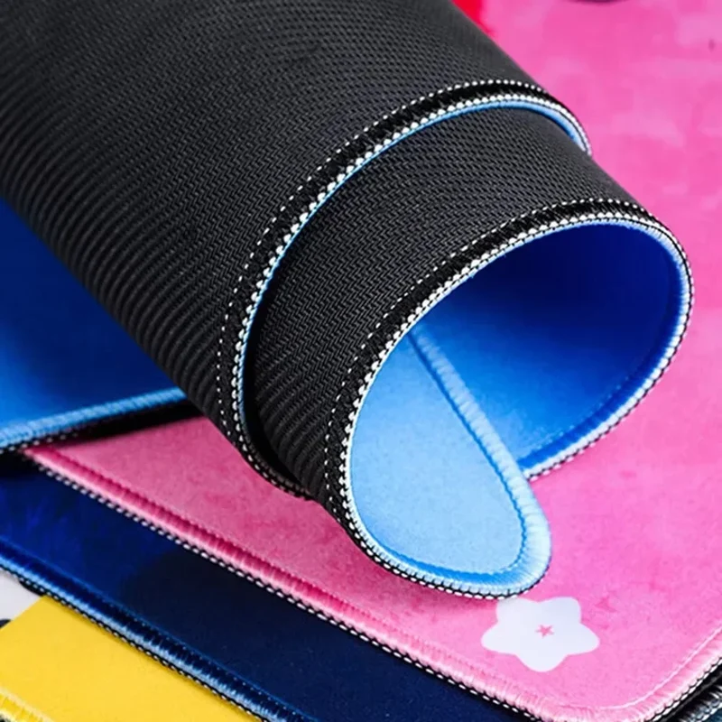 Tapis de souris XXL série grise — bords surjetés, base caoutchouc