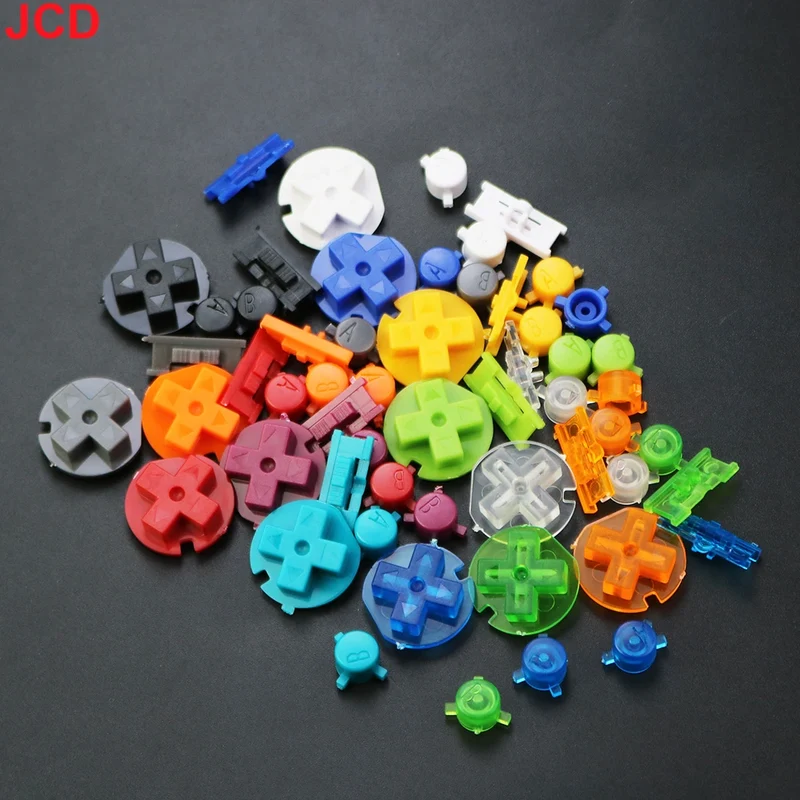 Jeu de boutons Game Boy Color — A/B, croix, Start/Select, 15 coloris