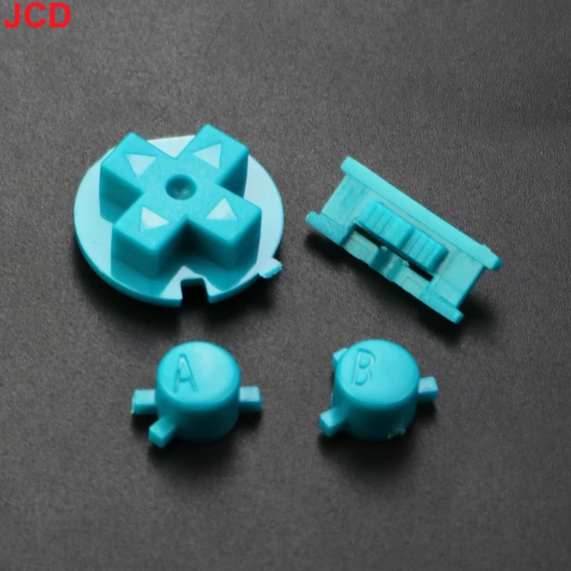 Jeu de boutons Game Boy Color — A/B, croix, Start/Select, 15 coloris