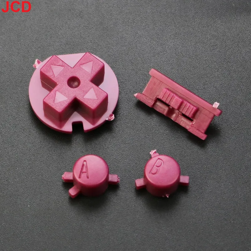 Jeu de boutons Game Boy Color — A/B, croix, Start/Select, 15 coloris