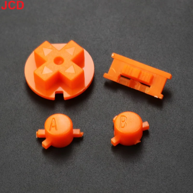 Jeu de boutons Game Boy Color — A/B, croix, Start/Select, 15 coloris