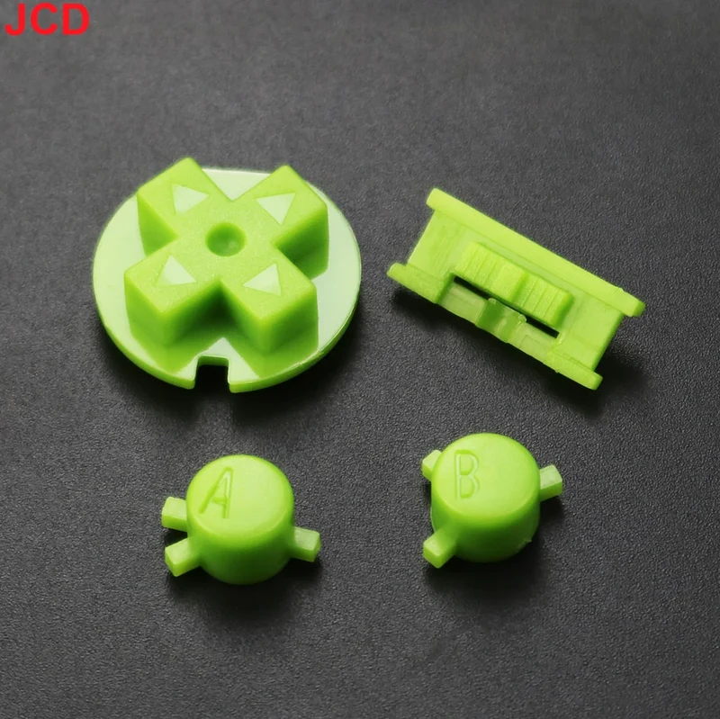 Jeu de boutons Game Boy Color — A/B, croix, Start/Select, 15 coloris