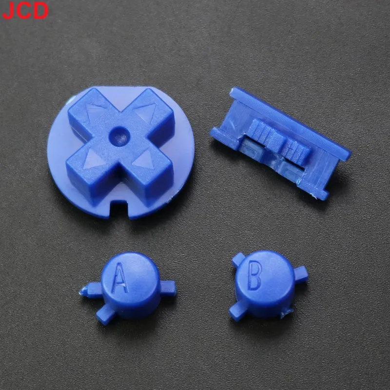 Jeu de boutons Game Boy Color — A/B, croix, Start/Select, 15 coloris