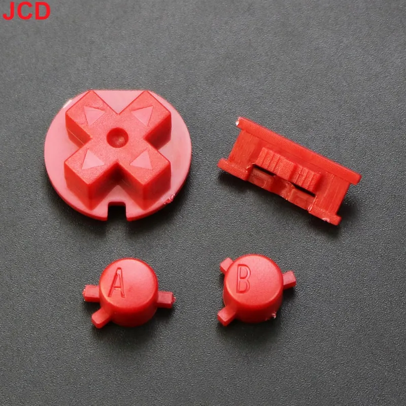 Jeu de boutons Game Boy Color — A/B, croix, Start/Select, 15 coloris