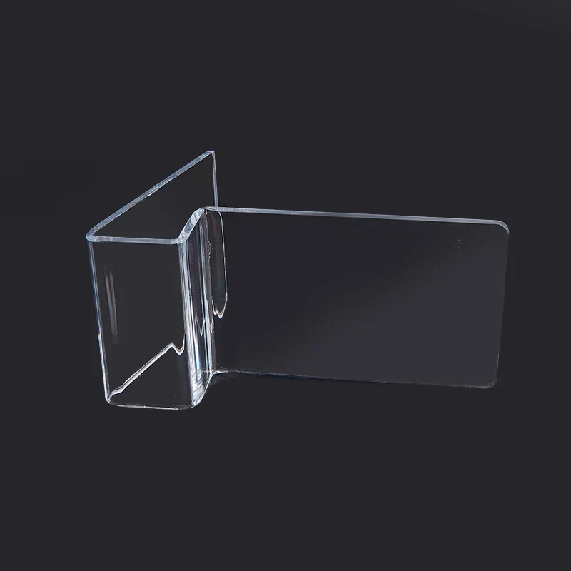Présentoir acrylique transparent — console portable et smartphone