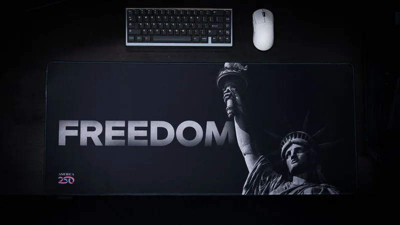 "Statue in black and white" — America 250 Deskmat