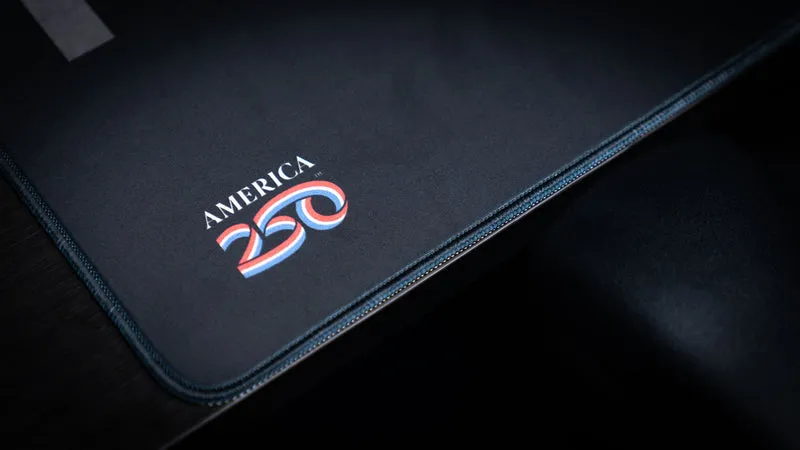 "Statue in black and white" — America 250 Deskmat