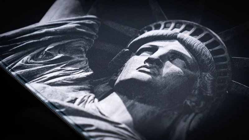"Statue in black and white" — America 250 Deskmat
