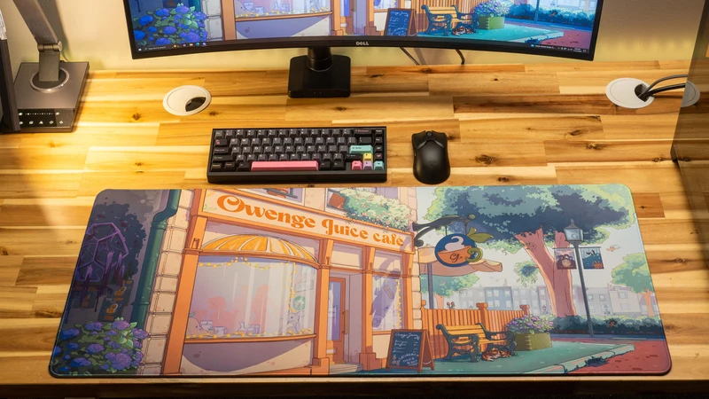 "The OwengeJuice Cafe" — OwengeJuice Deskmat