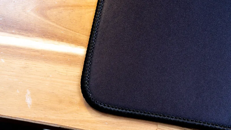 "OT" — Rust Deskmat