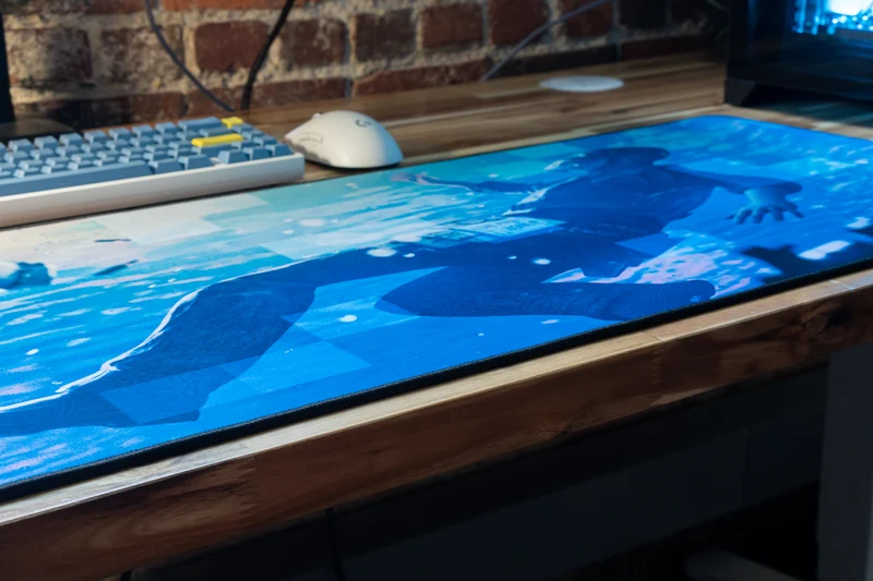 "Motion" — Rust Deskmat