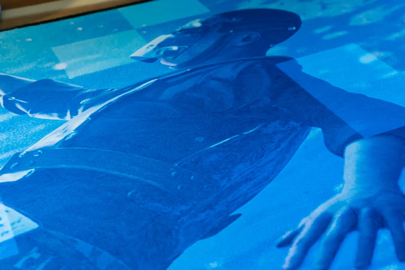 "Motion" — Rust Deskmat